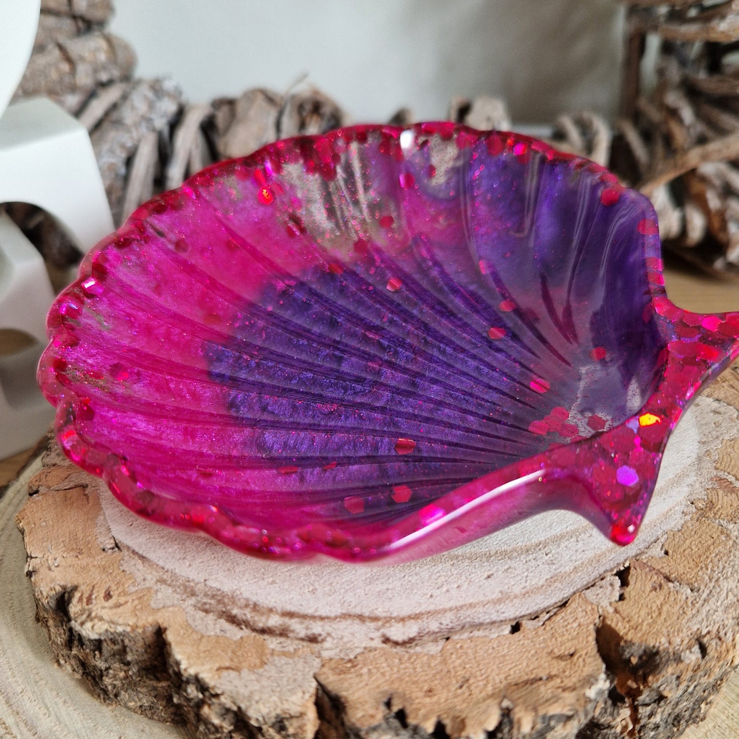 Side view of pink and purple trinket dish
