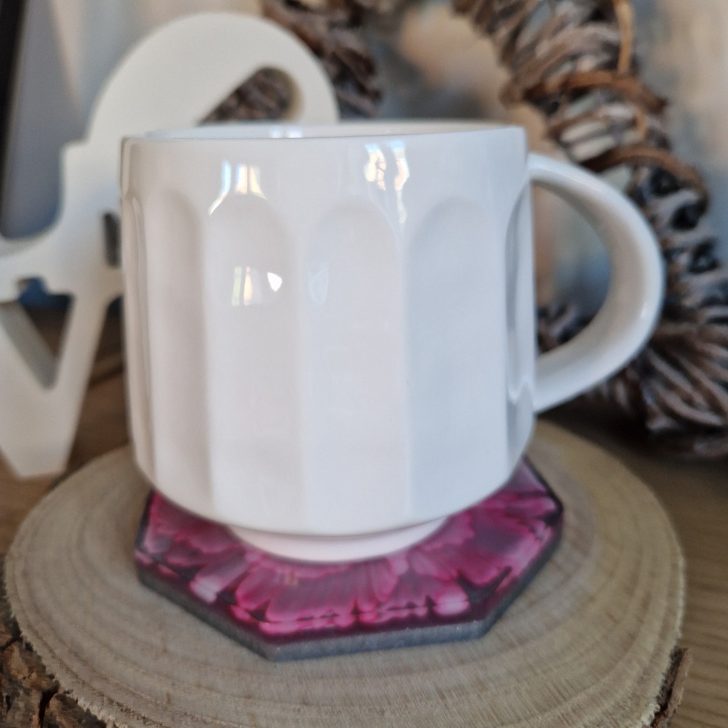 Resin bloom coasters with cherry alcohol ink design