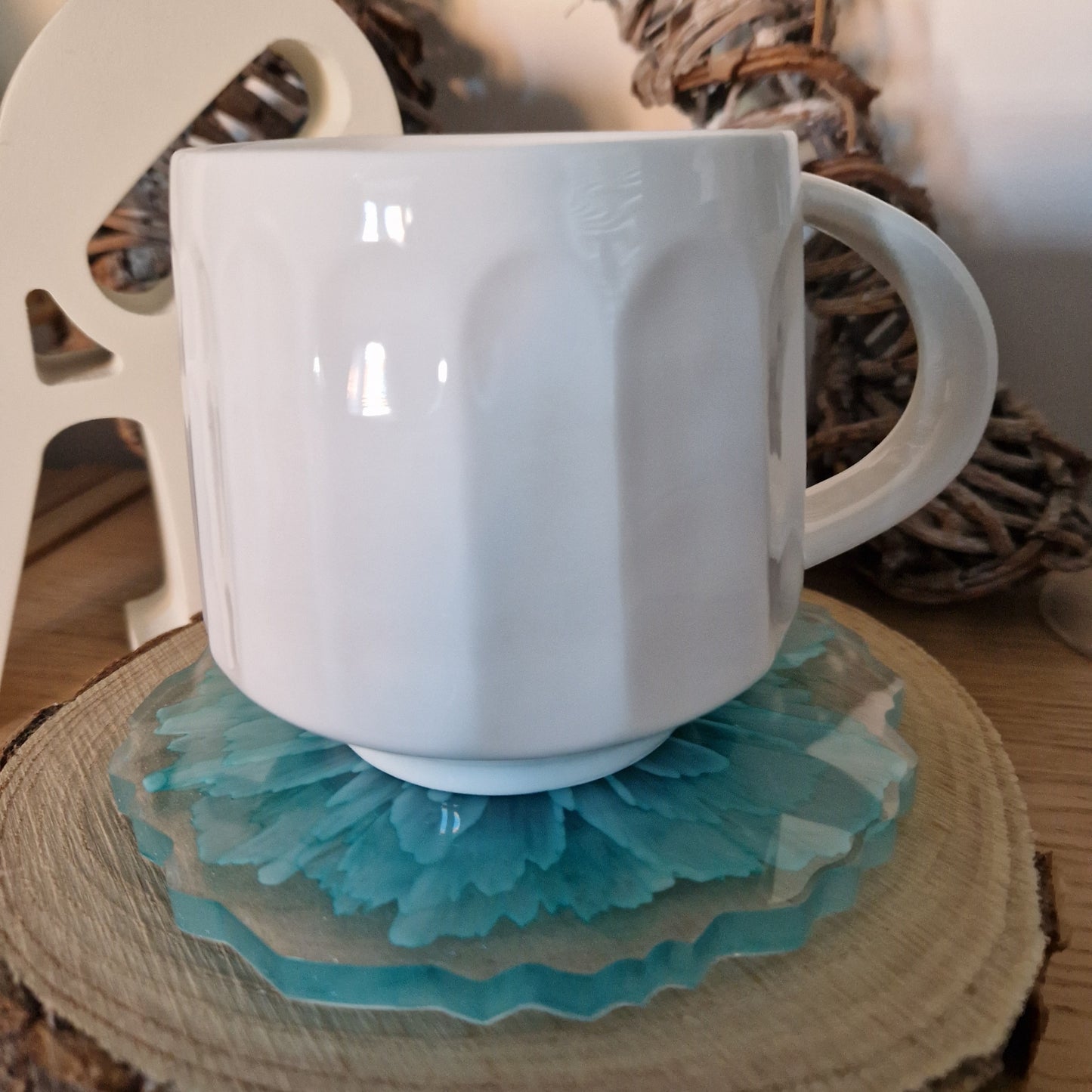 Resin bloom coasters with aqua alcohol ink design