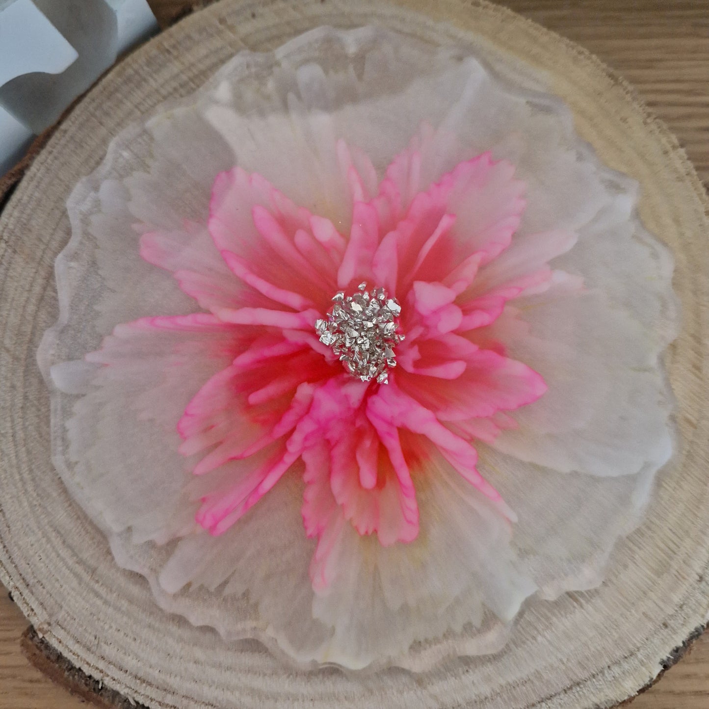 Resin bloom coasters with pink alcohol ink design