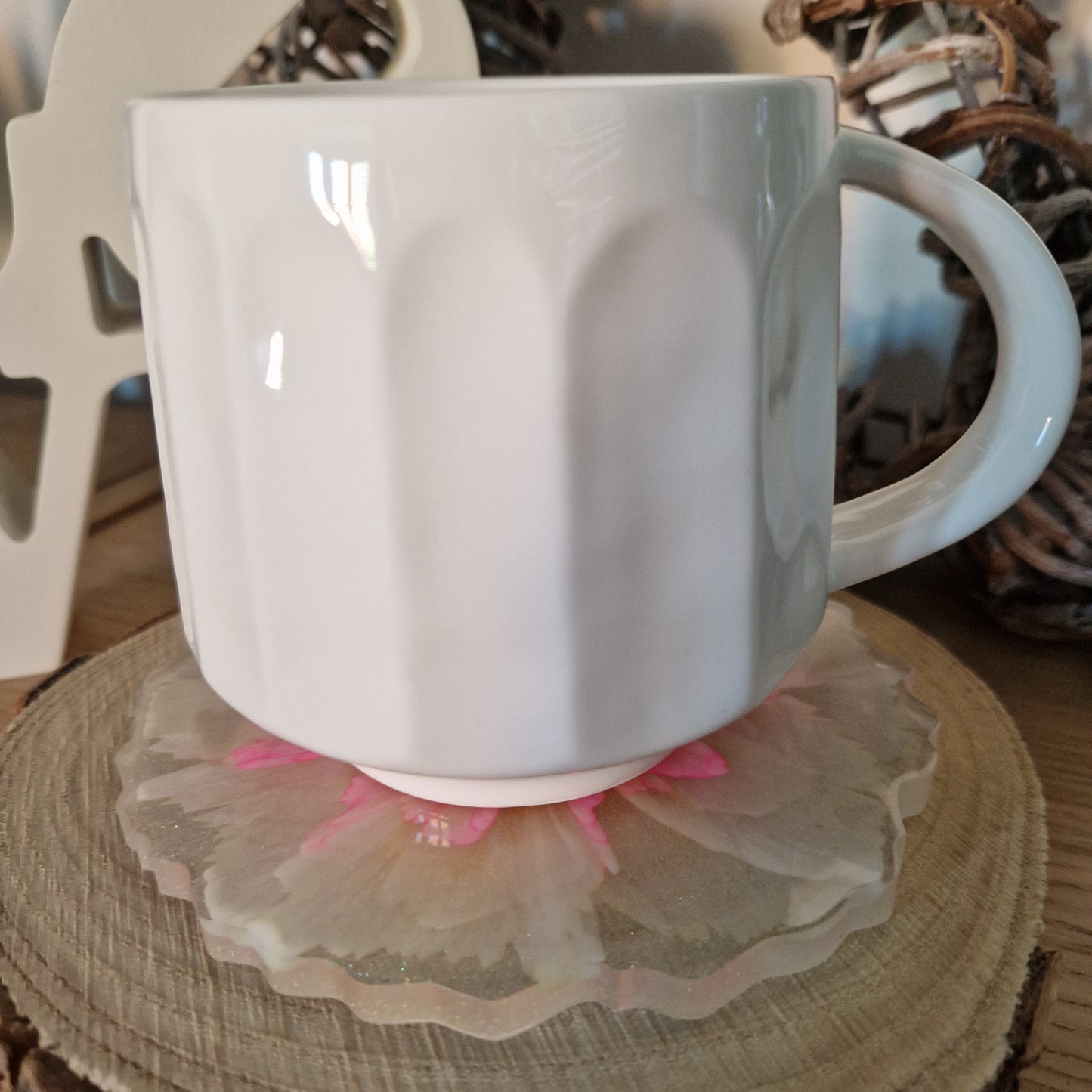 Resin bloom coasters with pink alcohol ink design