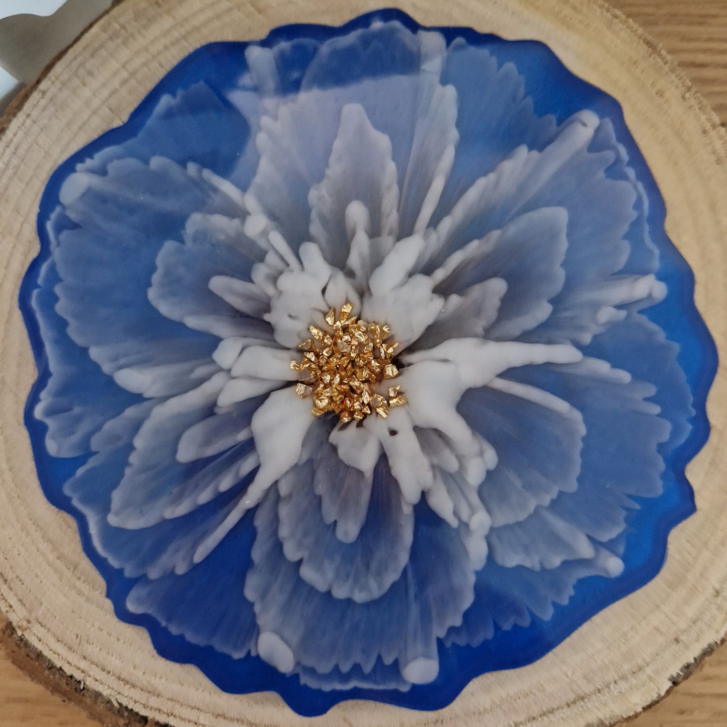 Resin bloom coaster with alcohol ink design