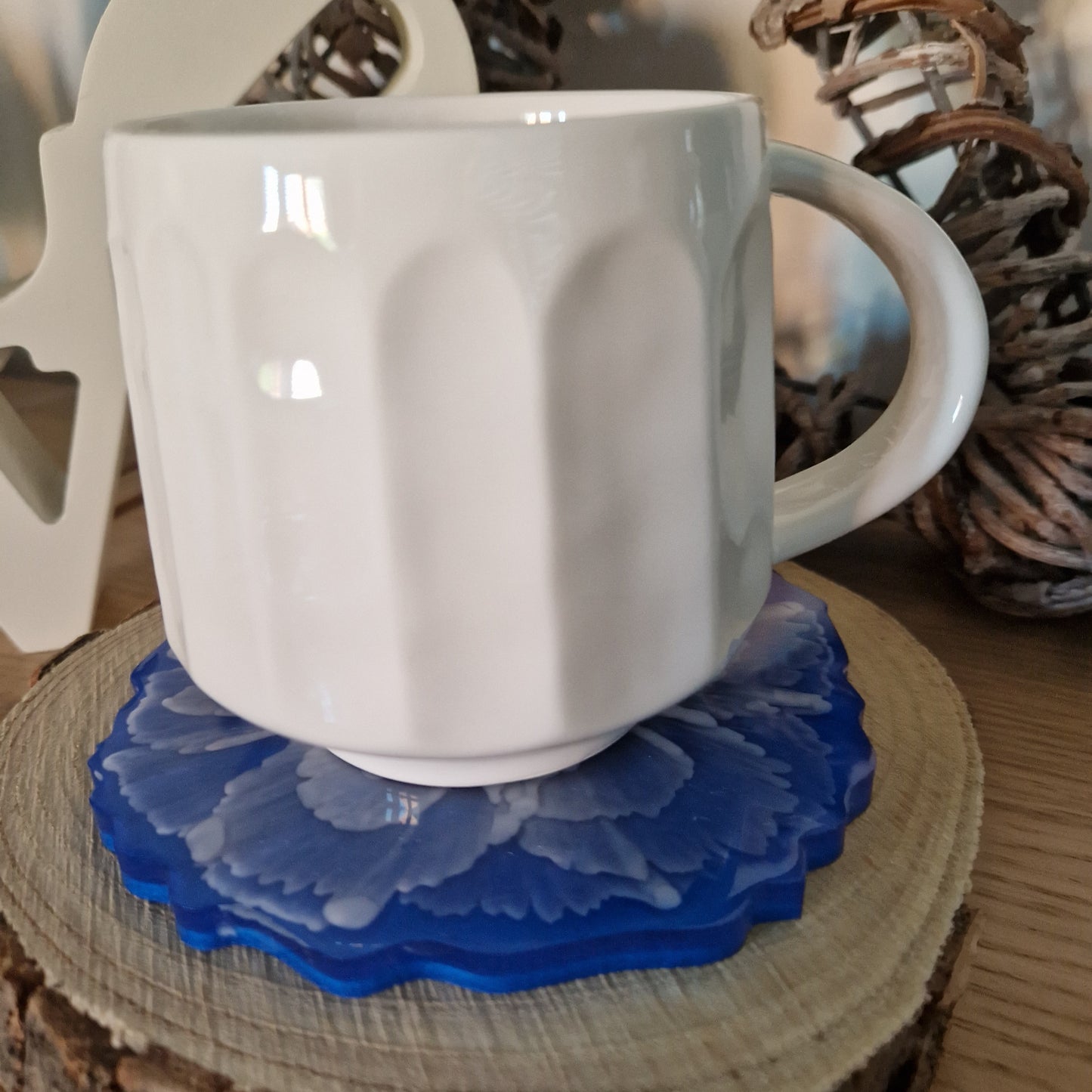 Resin bloom coaster with alcohol ink design