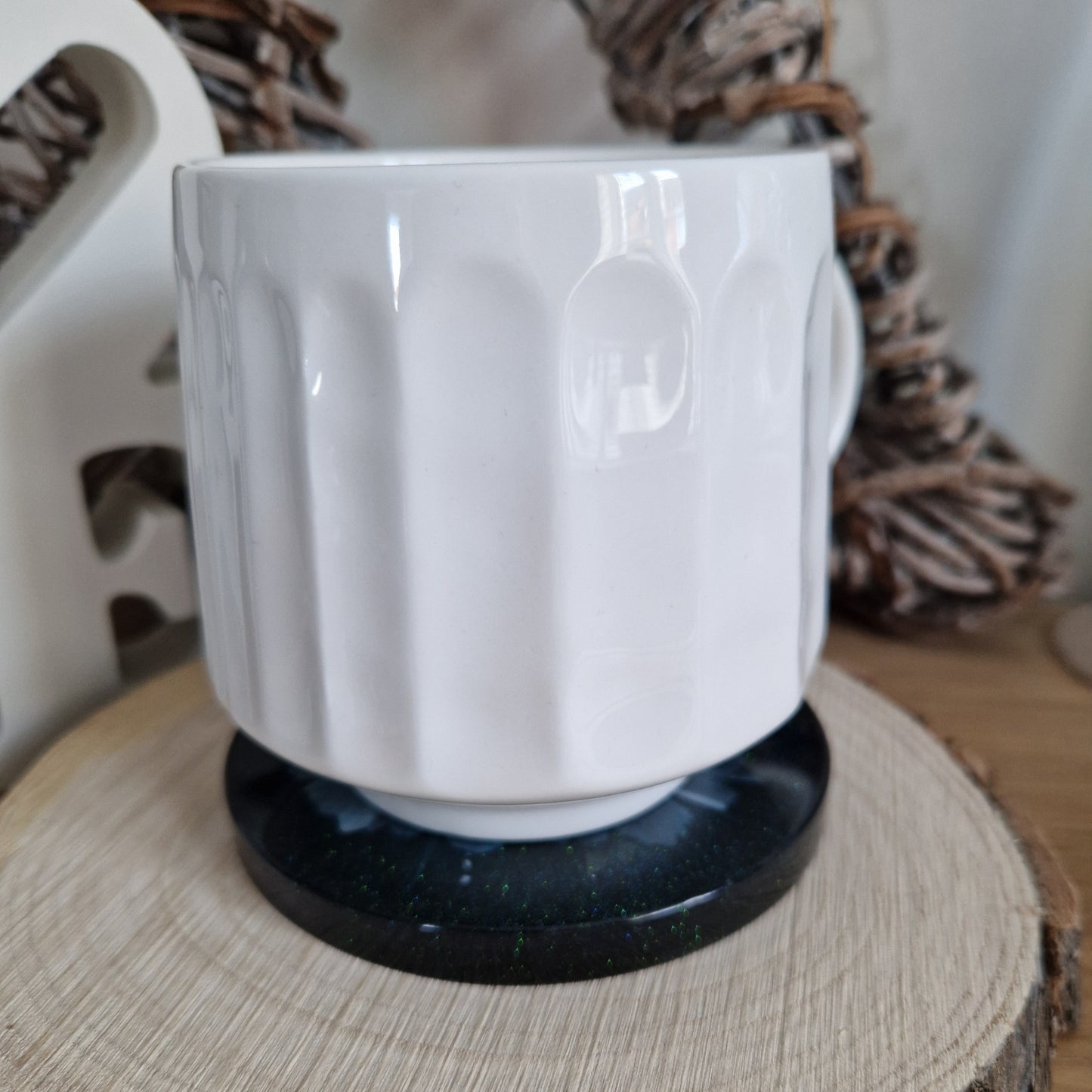 Resin bloom coasters with blue alcohol ink design