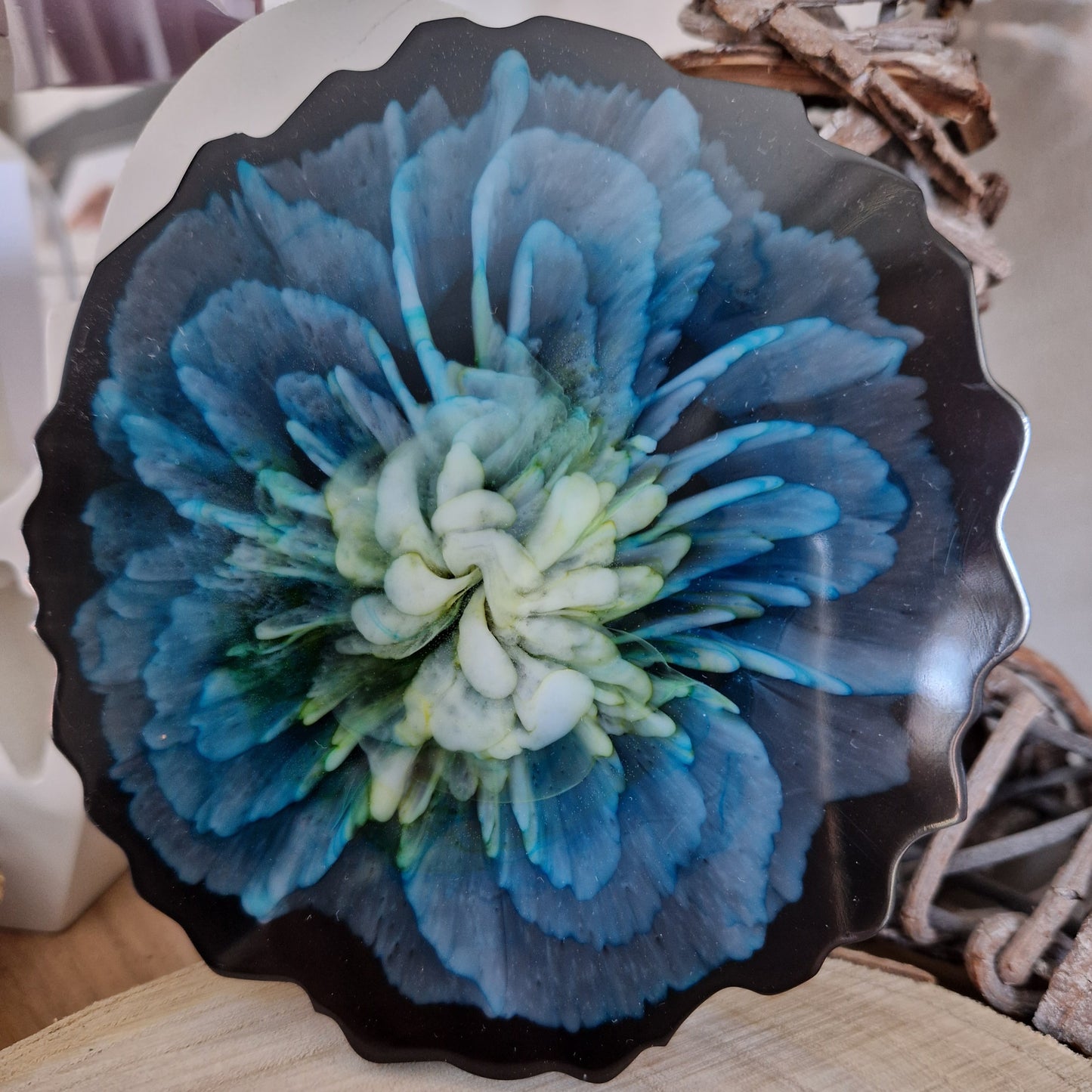 Resin bloom coasters with blue alcohol ink design
