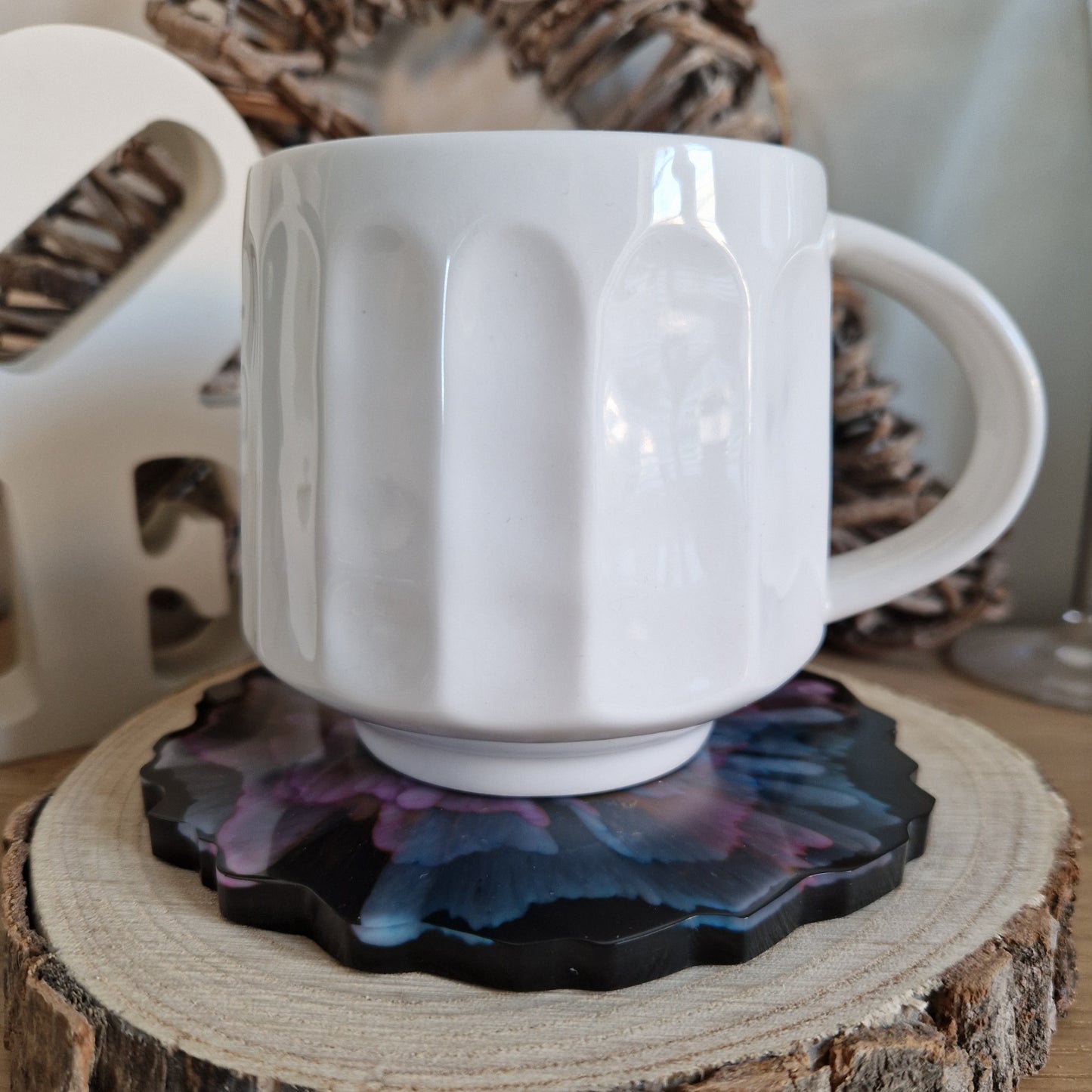 Resin bloom coasters with blue and pink alcohol ink design