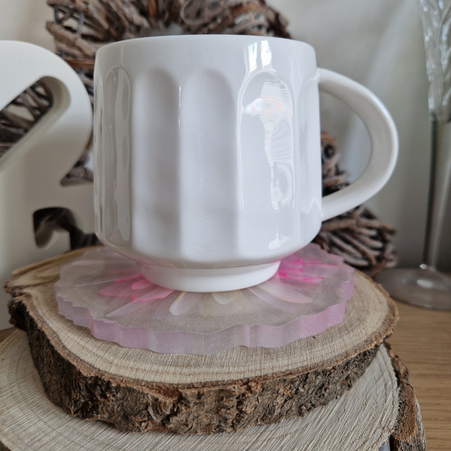 Resin bloom coaster with fuchsia and yellow alcohol ink design