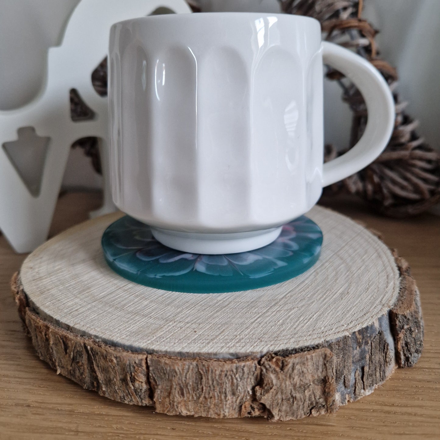 Resin bloom coaster with lemon and peach alcohol ink design