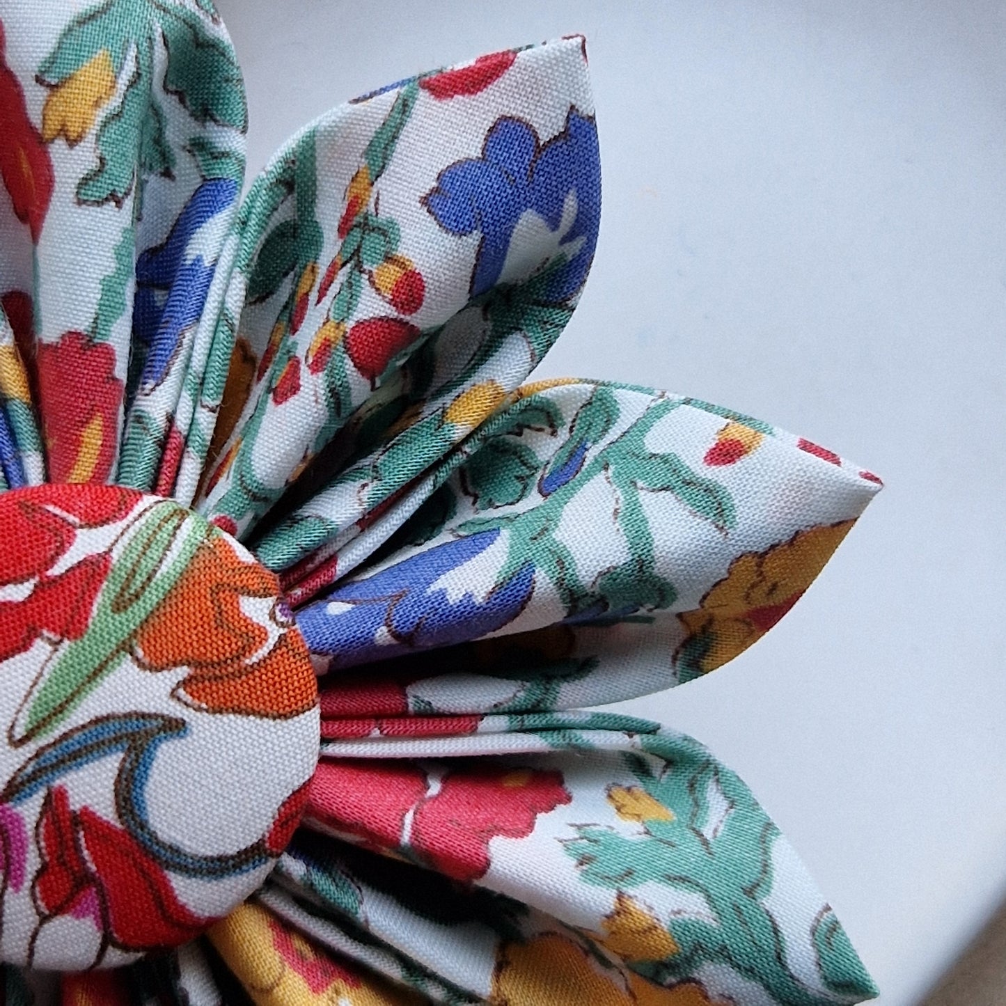 Leilani - Vintage Liberty fabric kanzashi-style flower brooch - orange, yellow and blue floral print