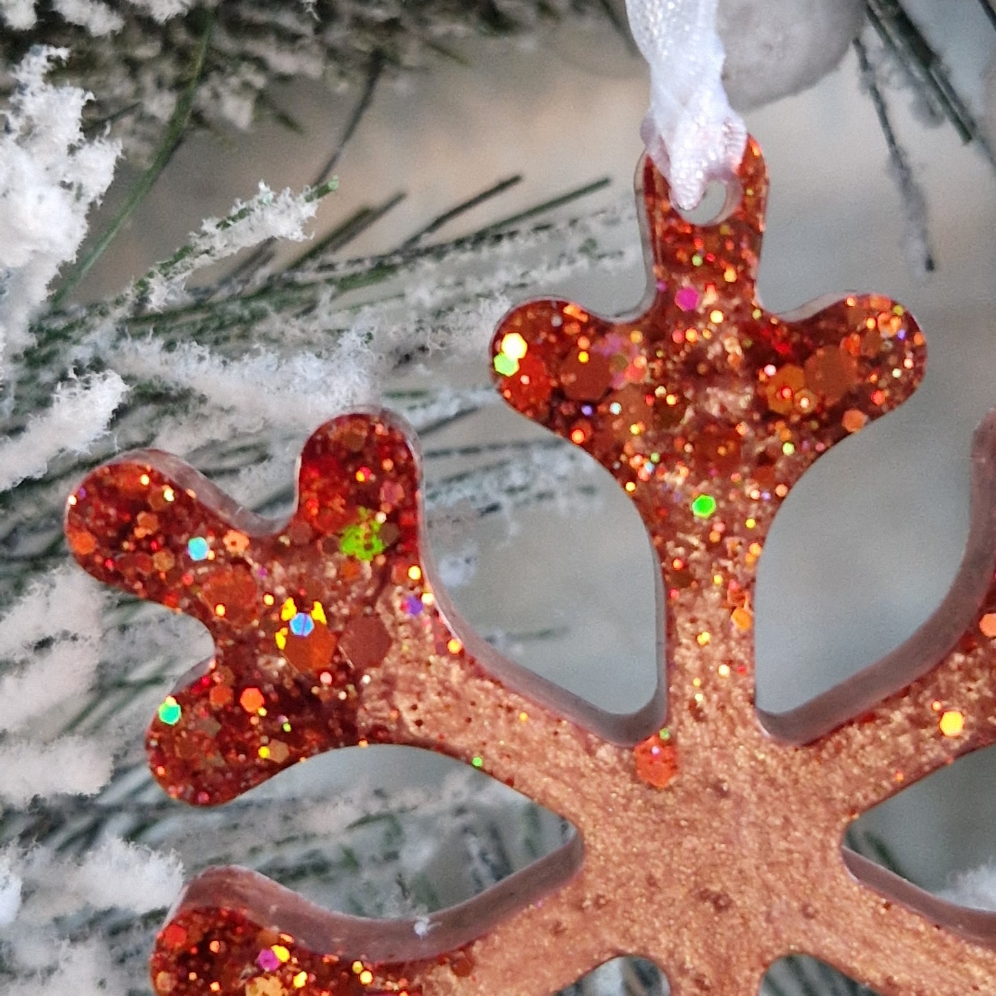 Close up of rose gold resin snowflake decoration
