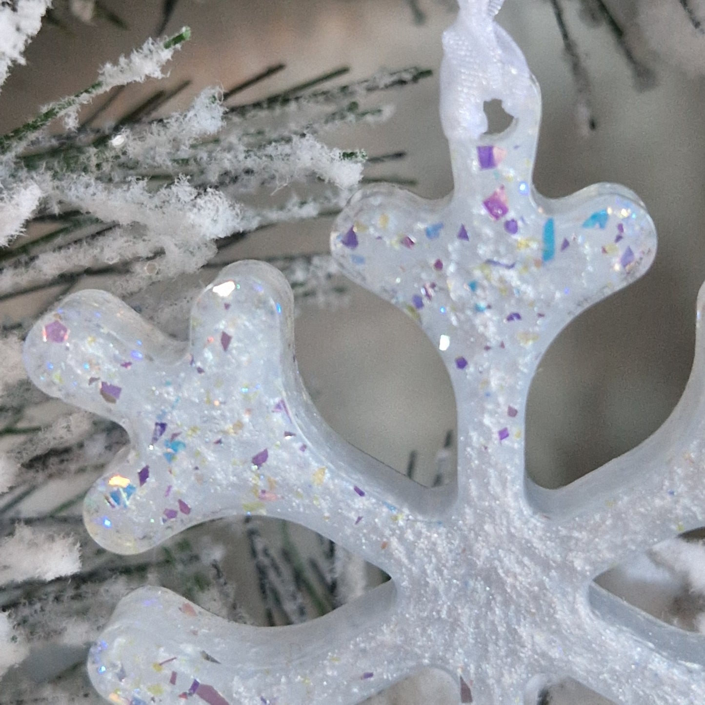 Close up of white resin snowflake decoration