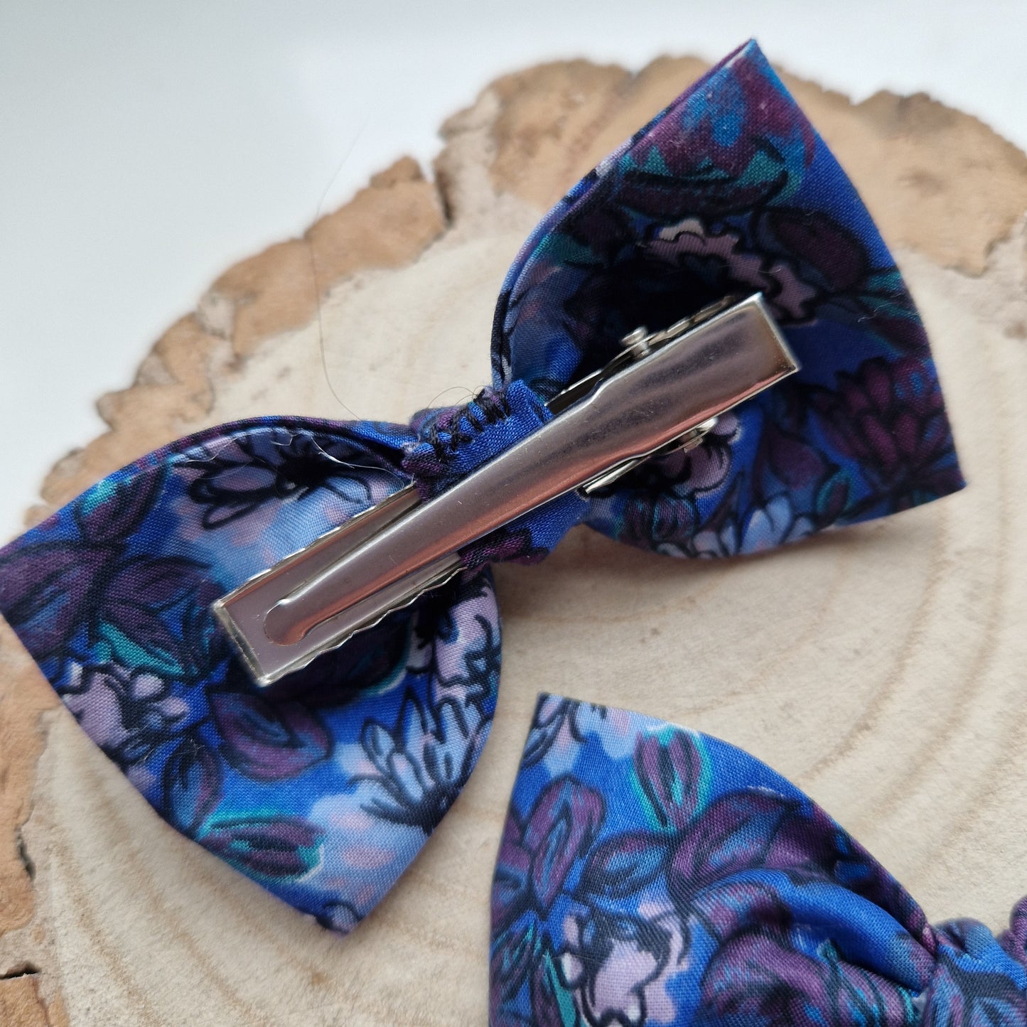 Pair of dinky vintage Liberty print hair bows in blue floral fabric