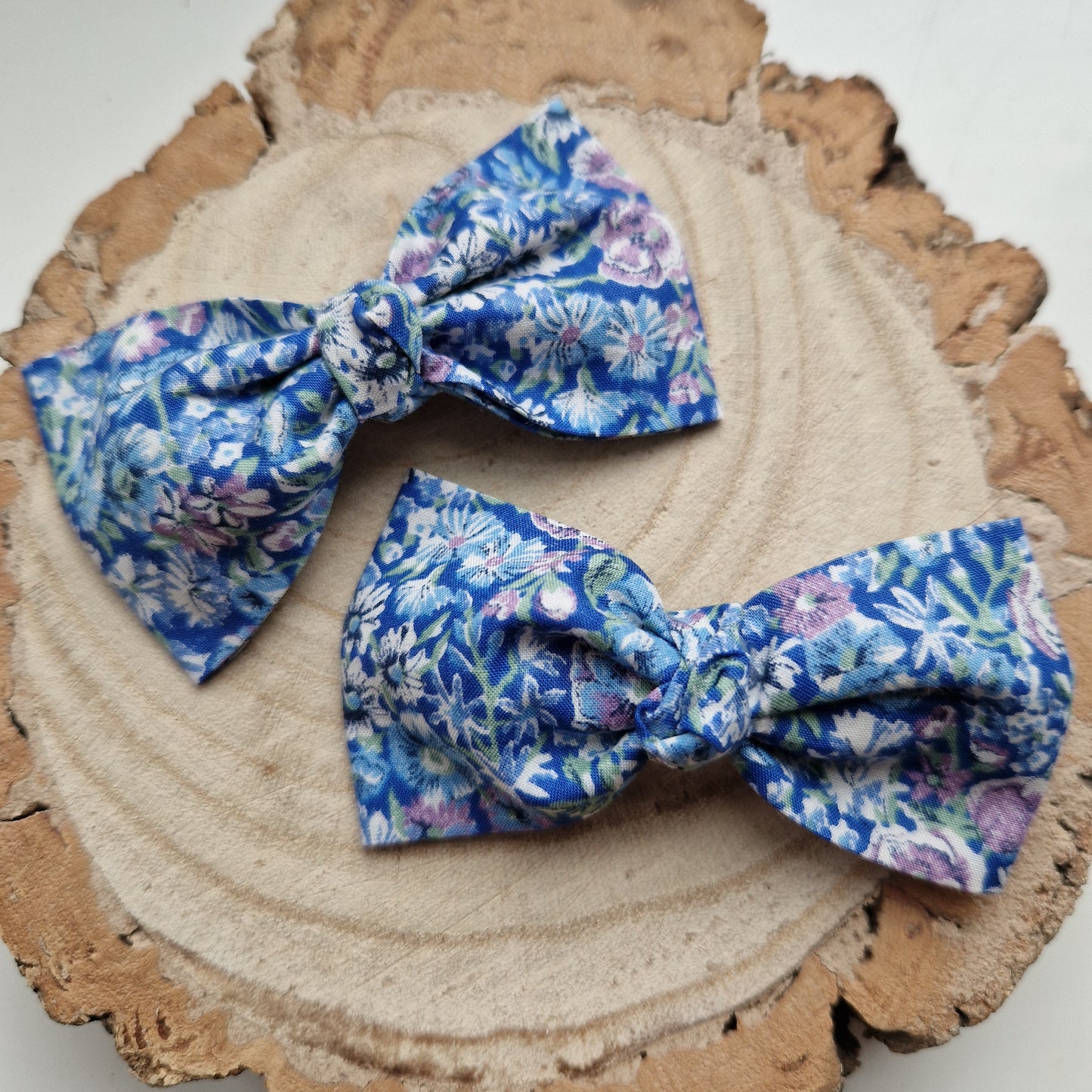 Pair of dinky vintage Liberty print hair bows in blue floral fabric