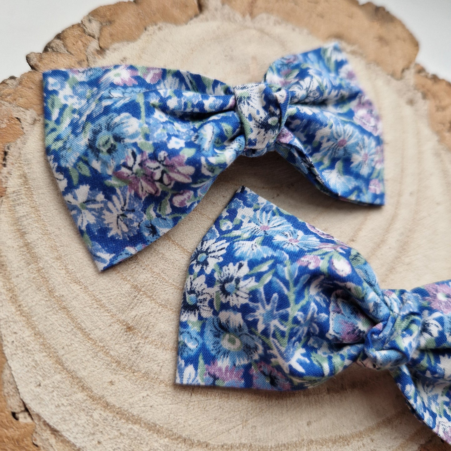 Pair of dinky vintage Liberty print hair bows in blue floral fabric
