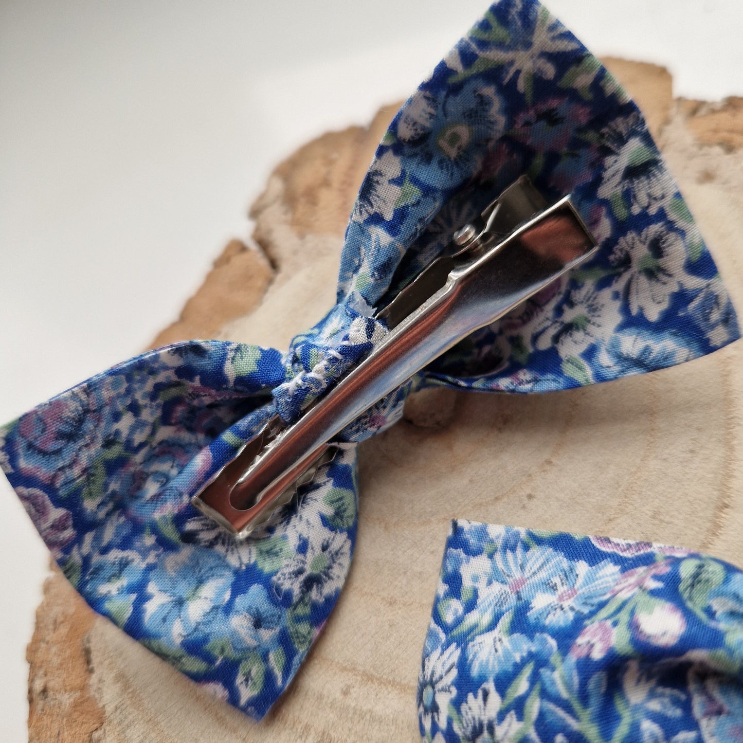 Pair of dinky vintage Liberty print hair bows in blue floral fabric