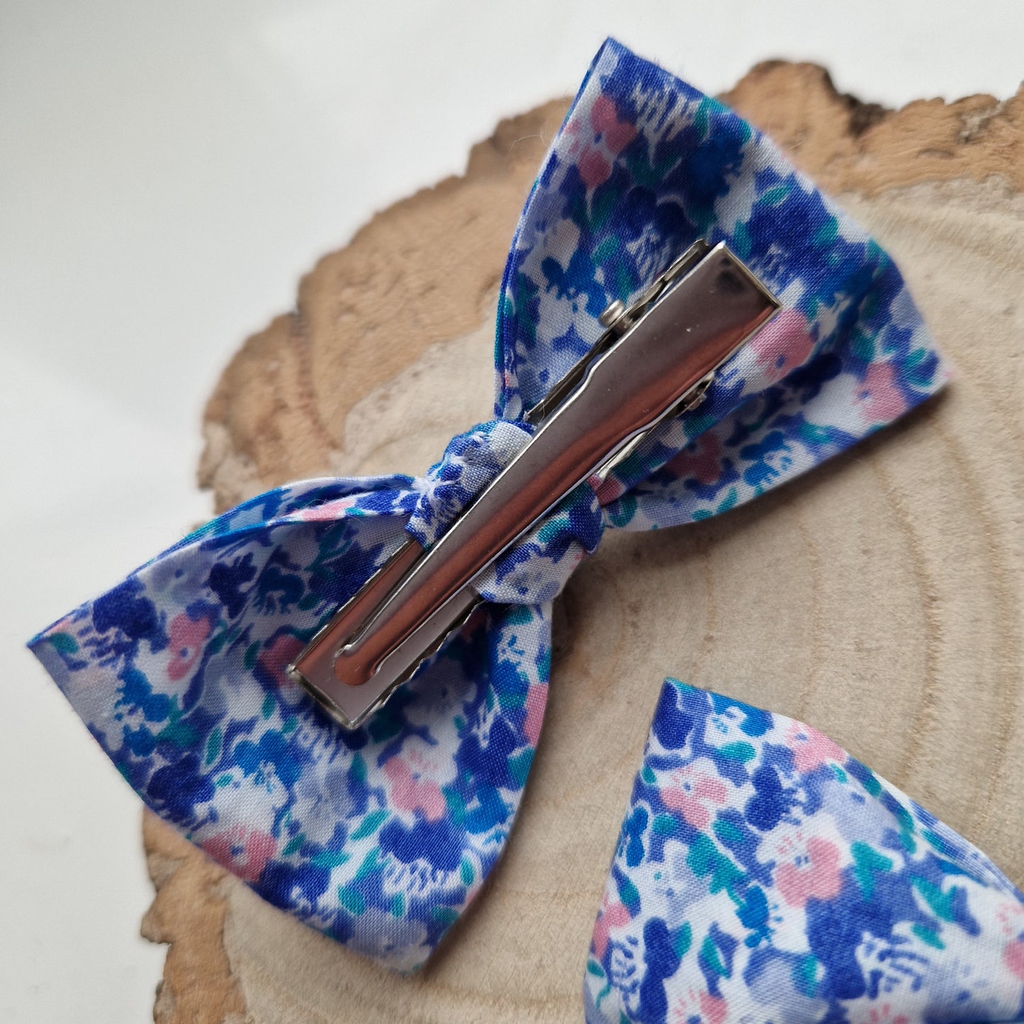 Pair of dinky vintage Liberty print hair bows in ditsy blue floral fabric