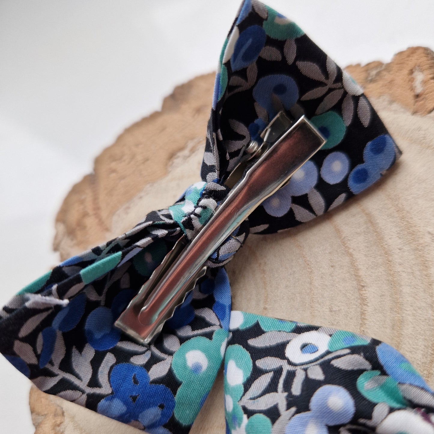 Pair of dinky vintage Liberty print hair bows in blue berry fabric