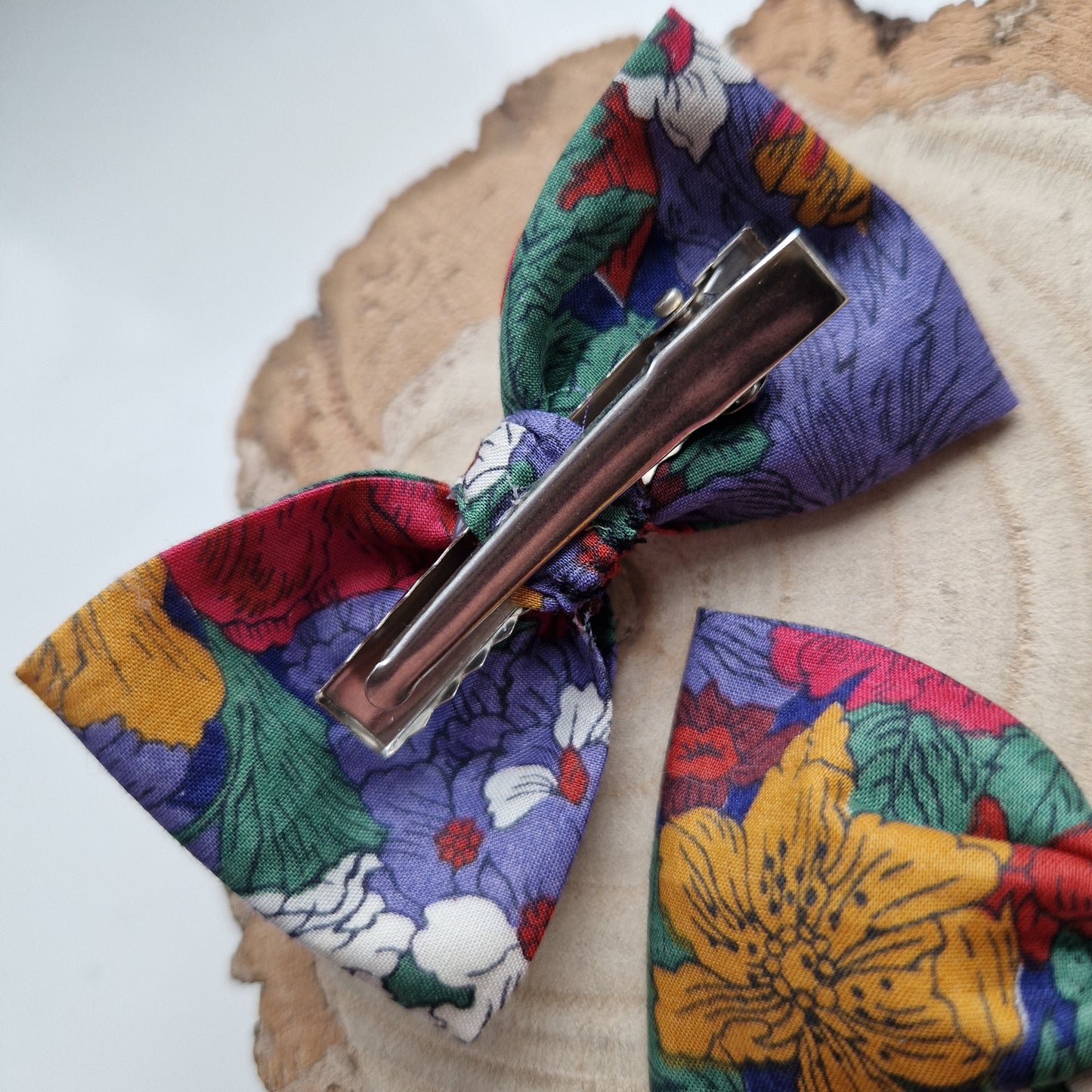 Pair of dinky vintage Liberty print hair bows in deep red floral fabric