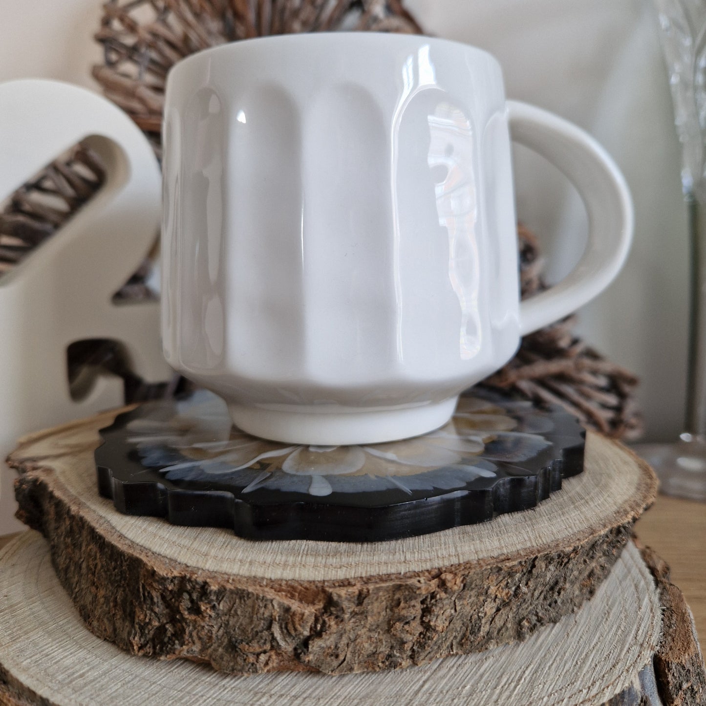 Resin bloom coaster with gold alcohol ink design