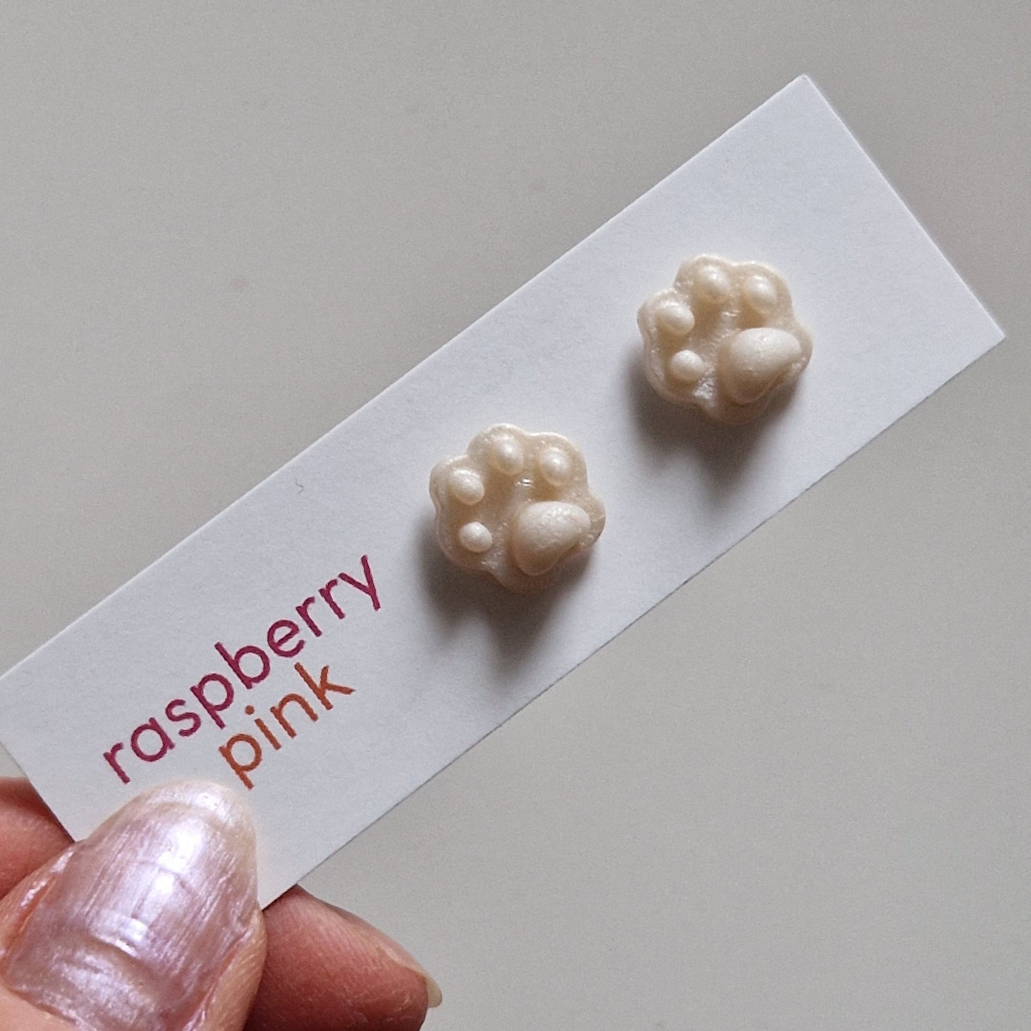 Clay Tiny Paw Print Stud Earrings - Embossed Ivory Shimmer