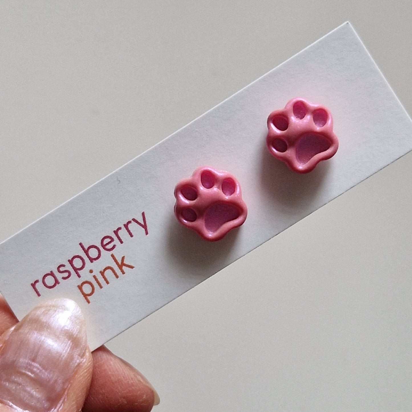 Clay Tiny Paw Print Stud Earrings - Debossed Pink Pearl