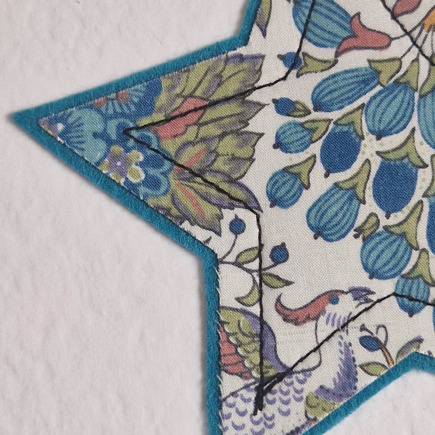 Vintage Liberty star card with a blue bird star and happy birthday sentiment
