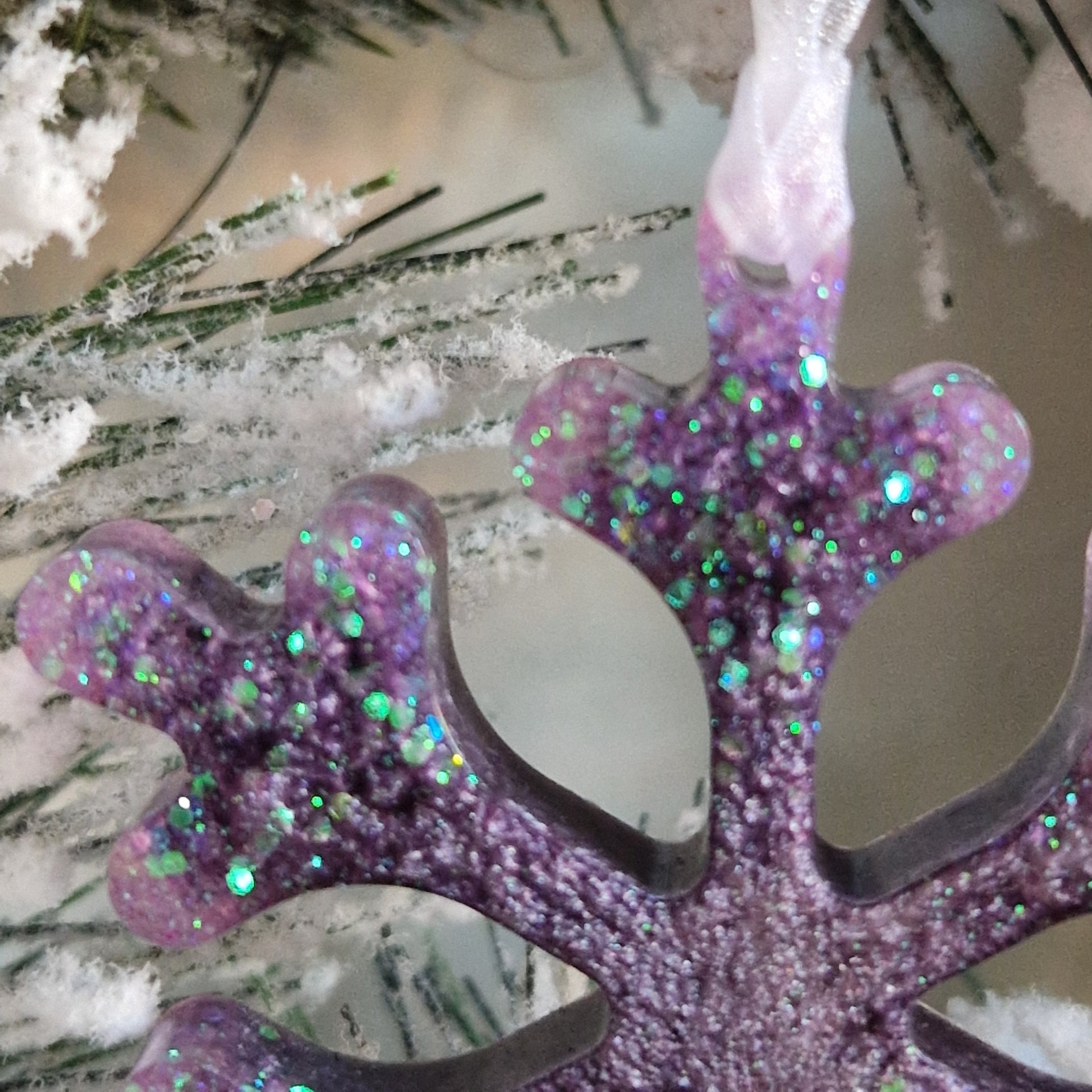 Close up of orchid resin snowflake decoration
