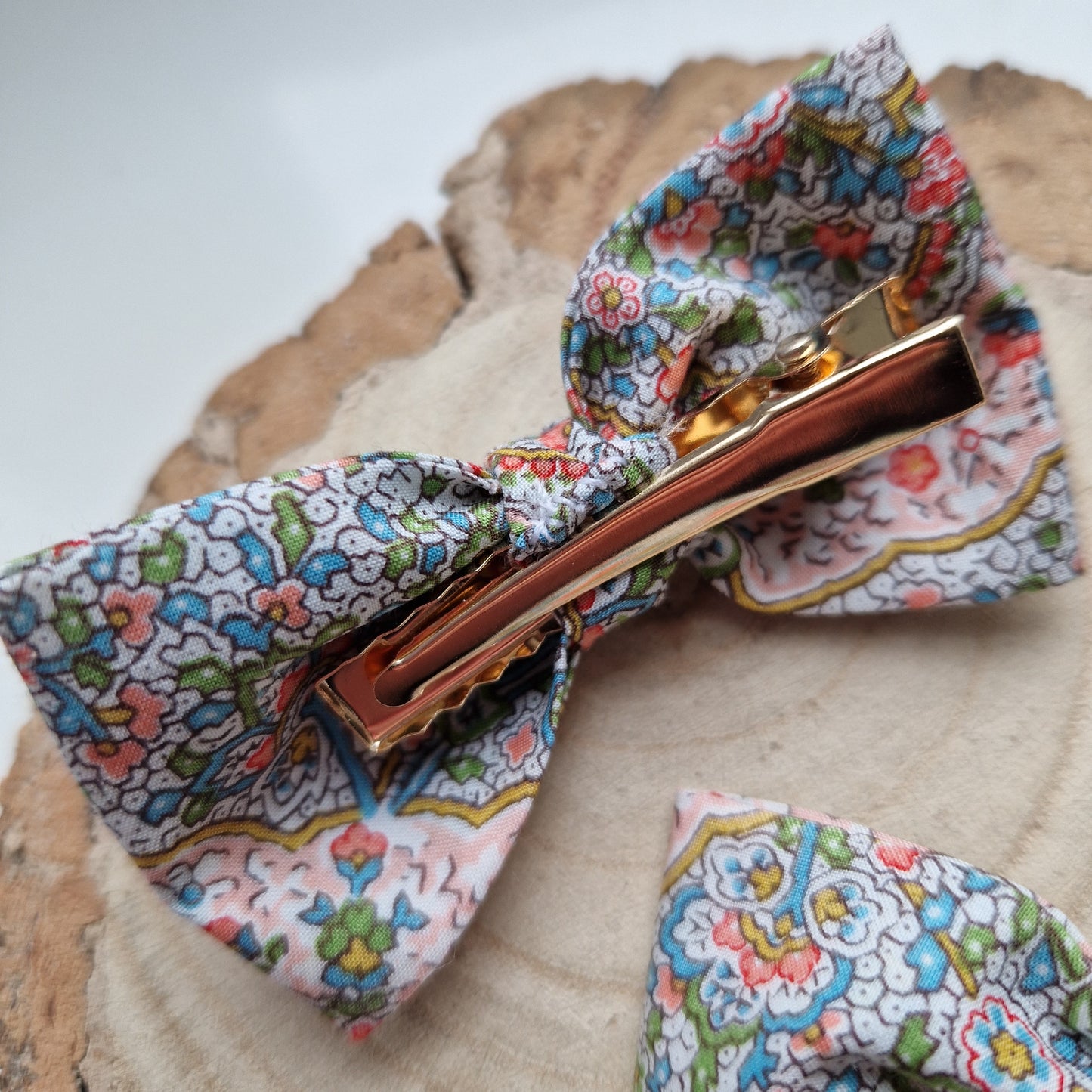 Pair of dinky vintage Liberty print hair bows in pastel paisley fabric