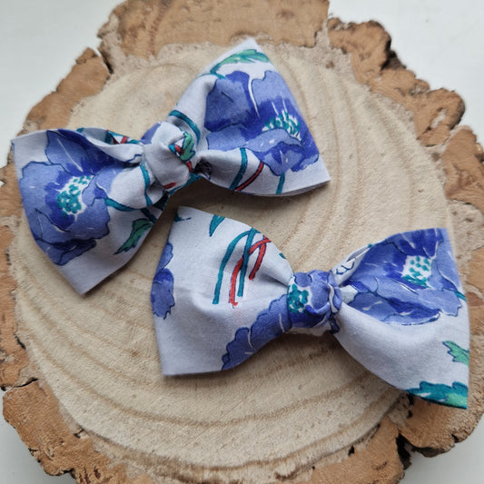 Pair of dinky vintage Liberty print hair bows in blue poppy fabric