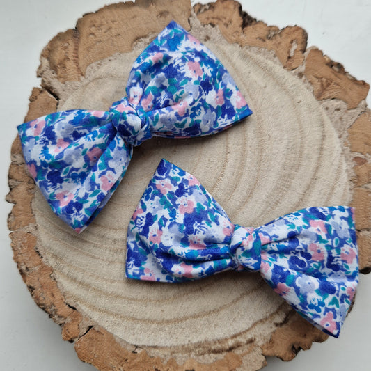 Pair of dinky vintage Liberty print hair bows in ditsy blue floral fabric