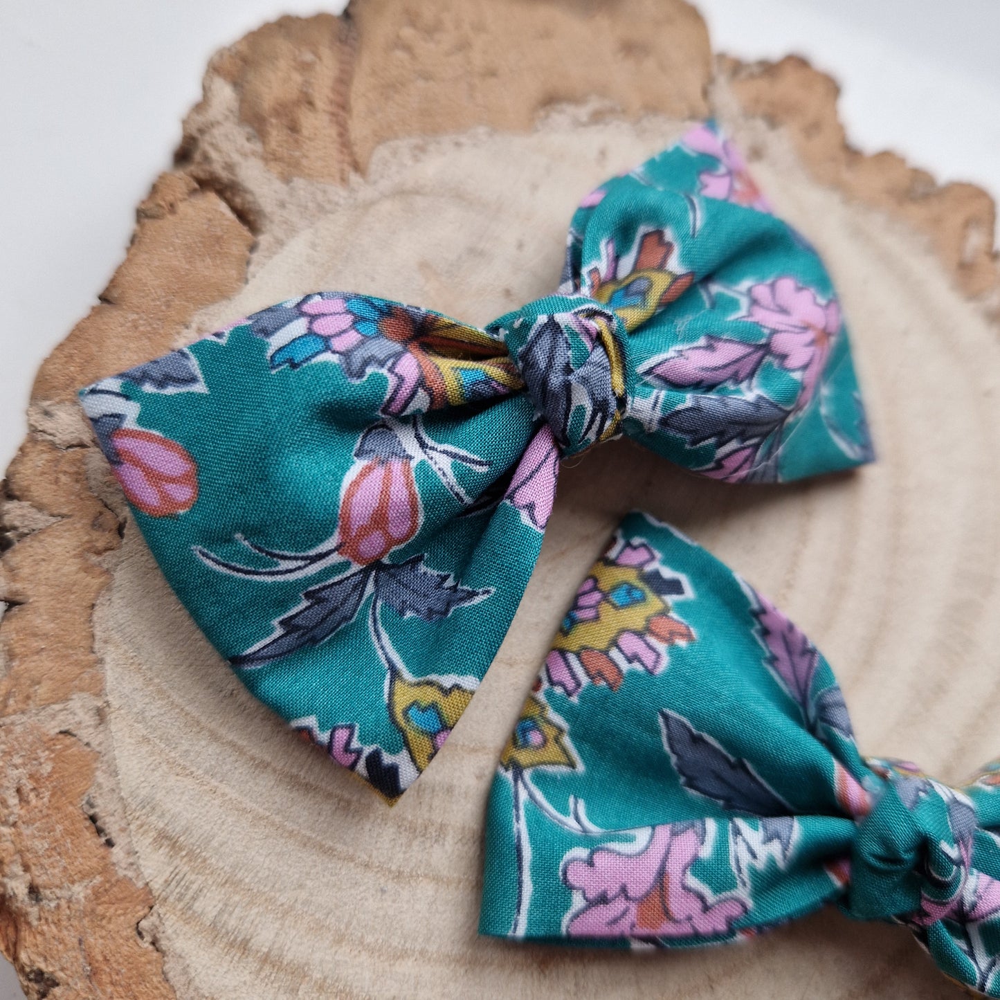 Pair of dinky vintage Liberty print hair bows in green floral fabric