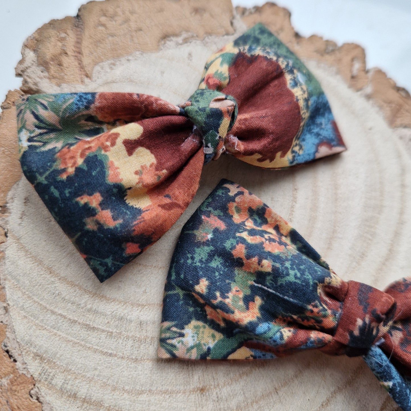 Pair of dinky vintage Liberty print hair bows in brown watercolour fabric