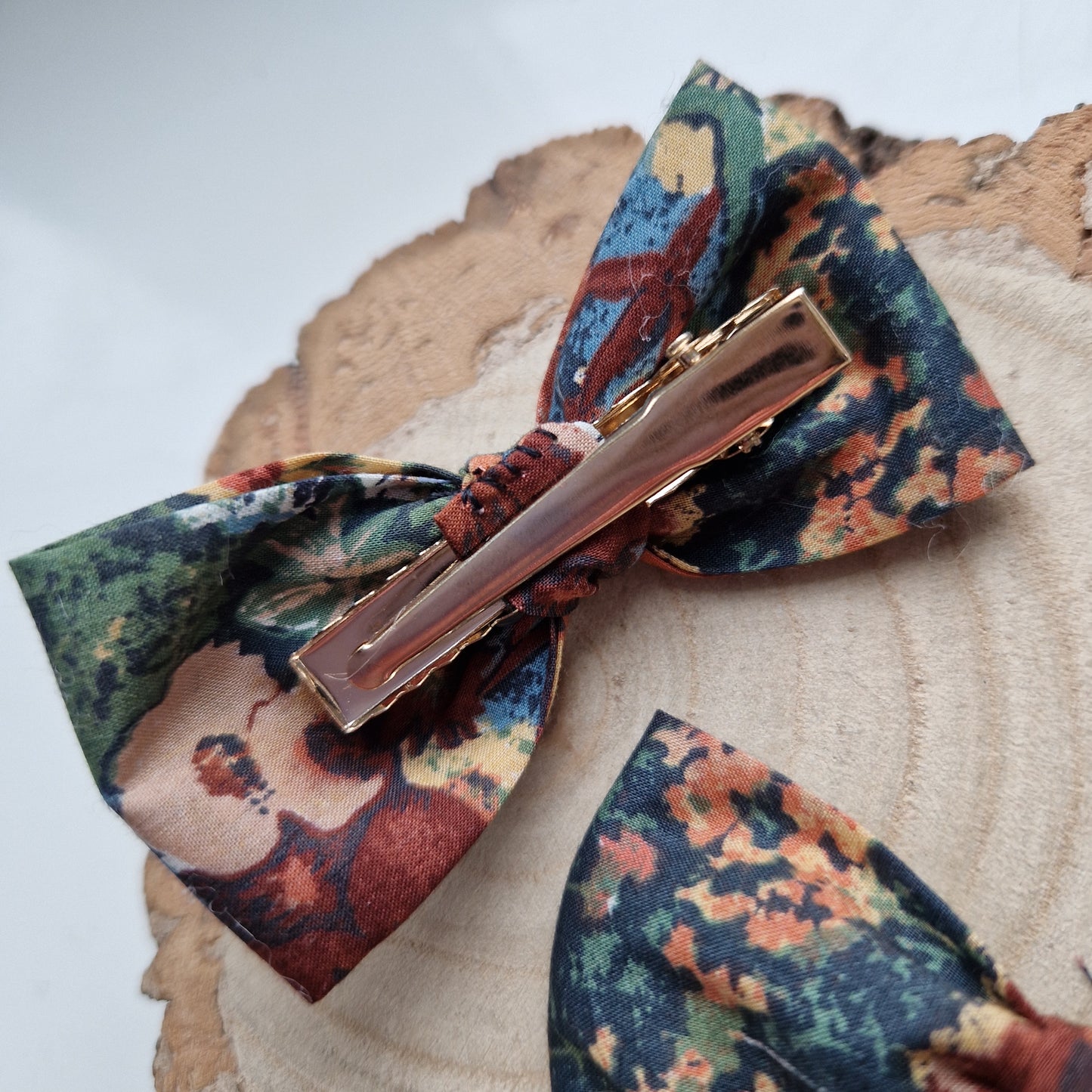 Pair of dinky vintage Liberty print hair bows in brown watercolour fabric